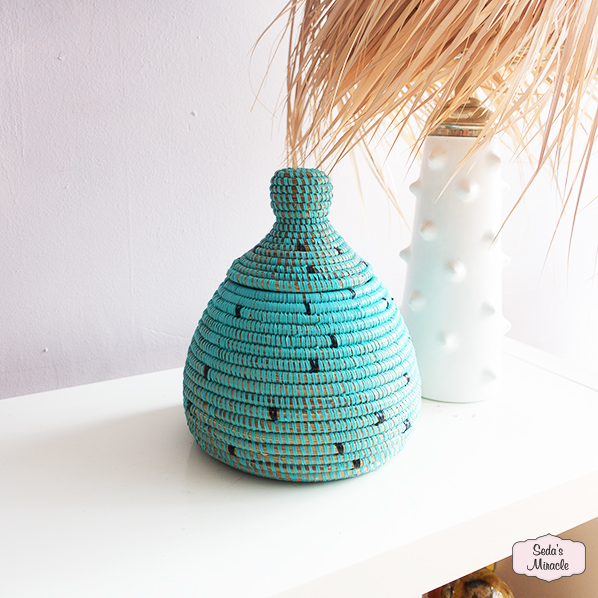 Afrikaanse Yas mand, turquoise met zwarte stippen